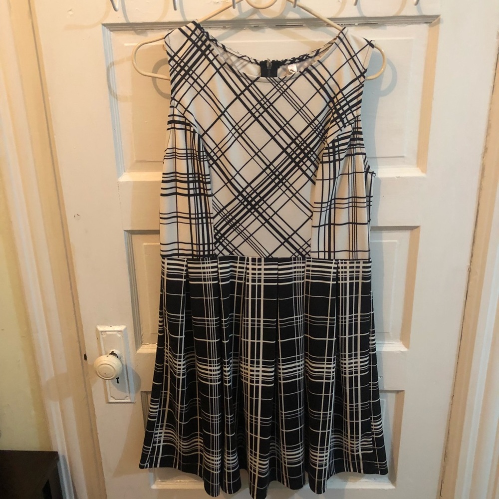 Above the knee black and white sleeveless dress